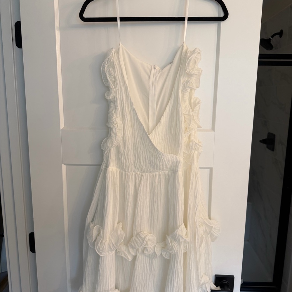 Elegant White Ruffled Mini Dress - Picture 2 of 7